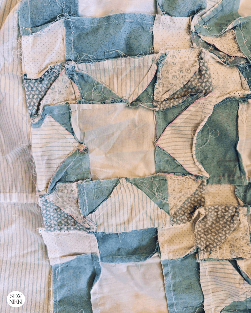 Showing the backside of this 40 year old unfinished quilt top by Sew Nikki
