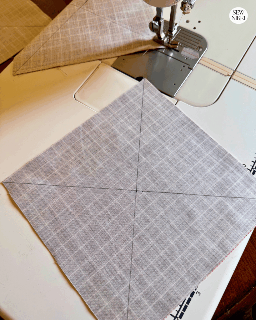 Magic 8 half square triangles by Sew Nikki - mark diagonal lines in both directions and sew a quarter inch seam along each side.