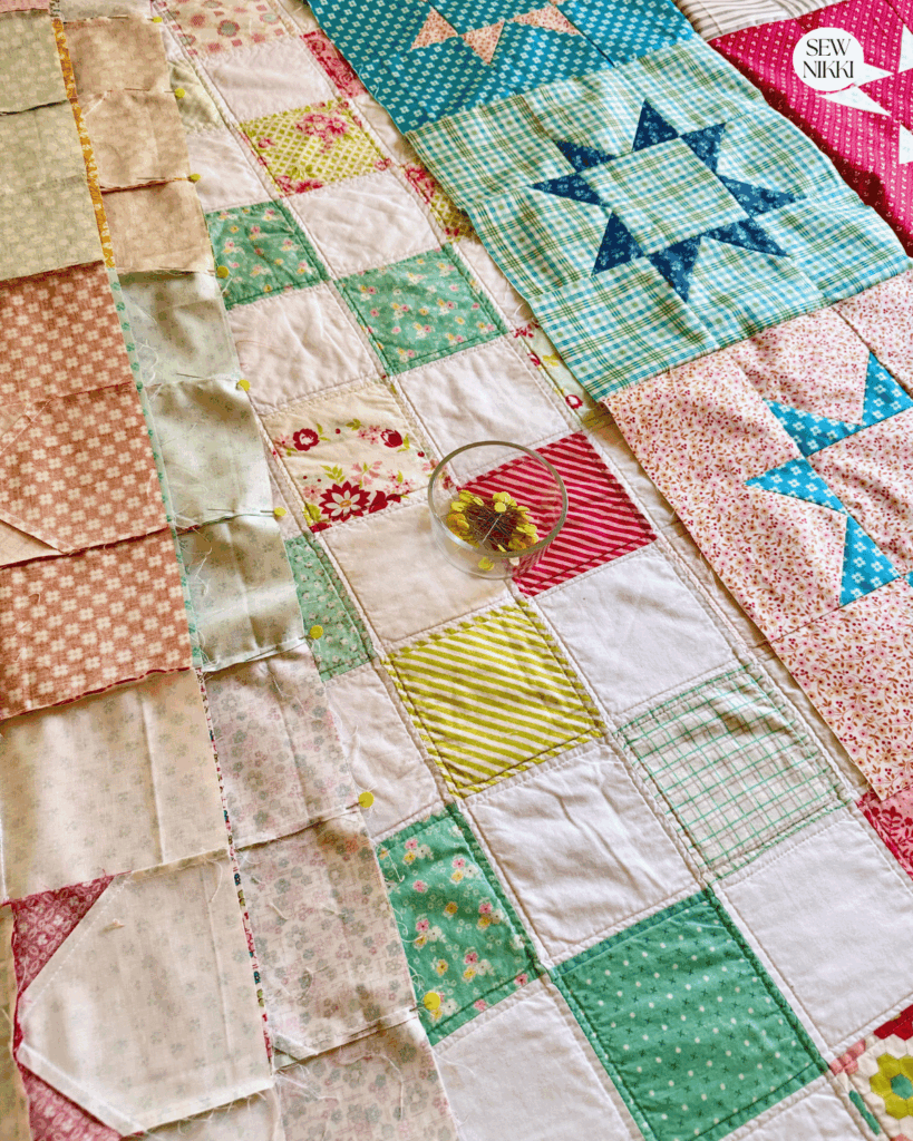 Sewing the rows together to finish this easy quilt top by Sew Nikki