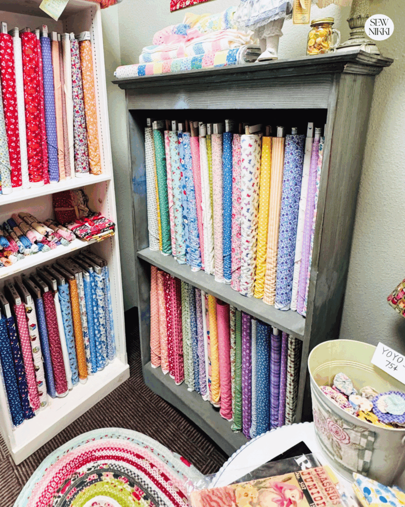 Fabric yardage in a quilt shop sold from the bolt by Sew Nikki