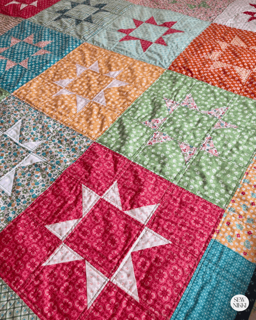 Here's a great fat quarter quilt pattern that features the eight point star block by Sew Nikki