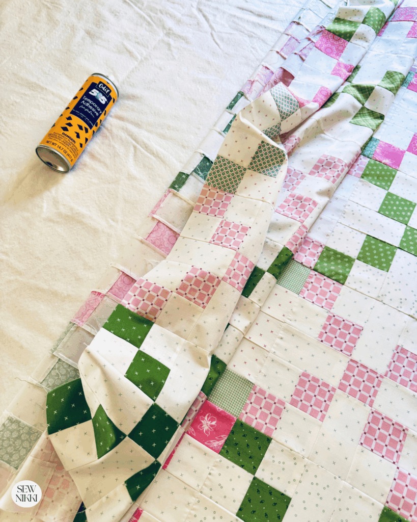 Love scrappy quilts and spray basting is my favorite method by Sew Nikki