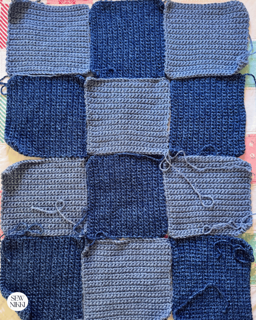 Square blanket crochet pattern built square by square by Sew Nikki